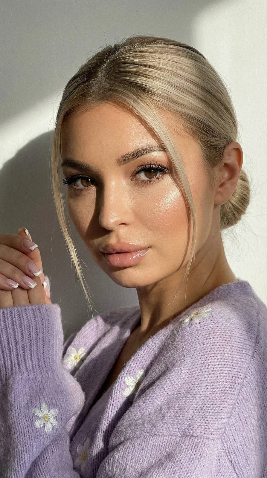 Manicure And Makeup By A Wall