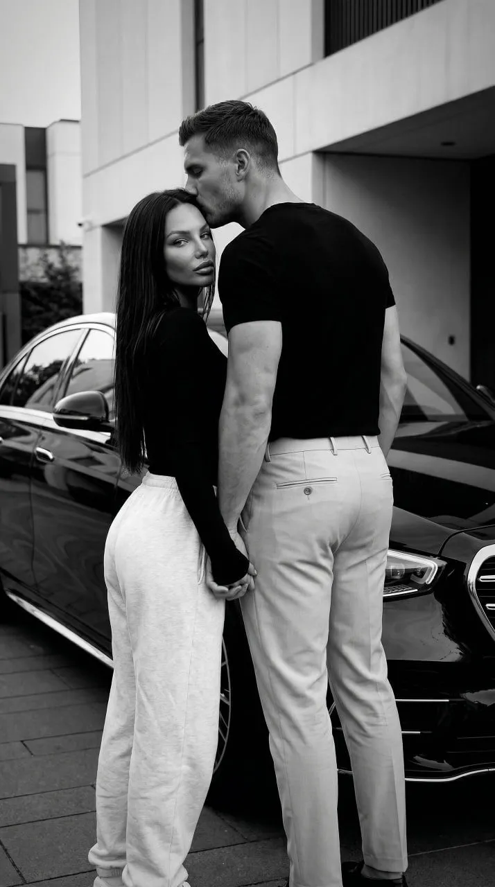 Couple Standing Beside Vintage Car Black And White