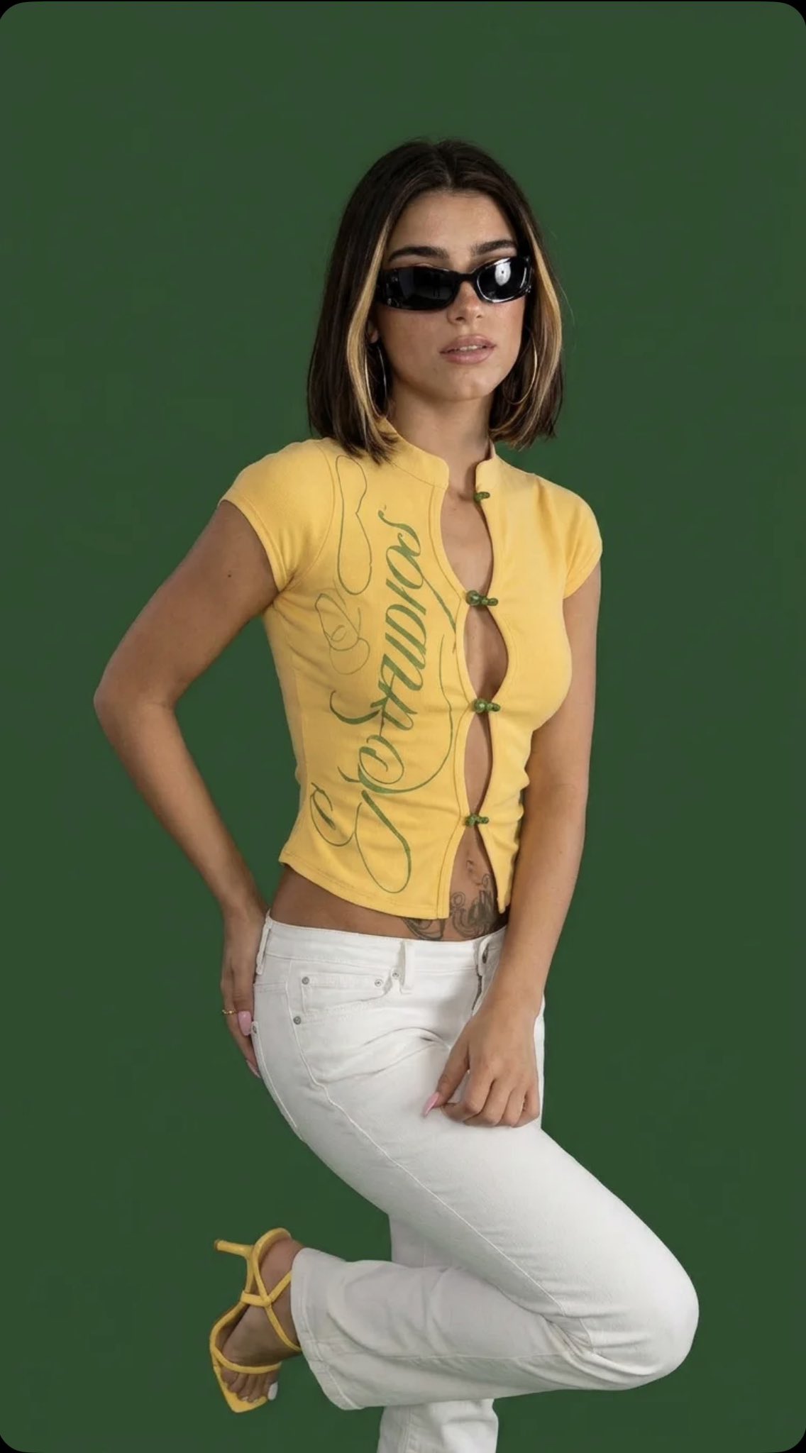 Yellow Top White Jeans Confident Pose