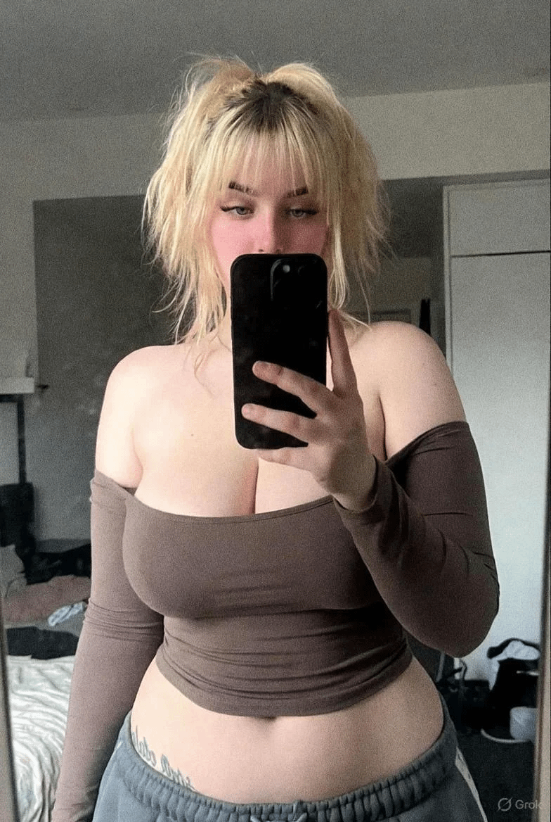 Long Sleeved In Smartphone In Bedroom