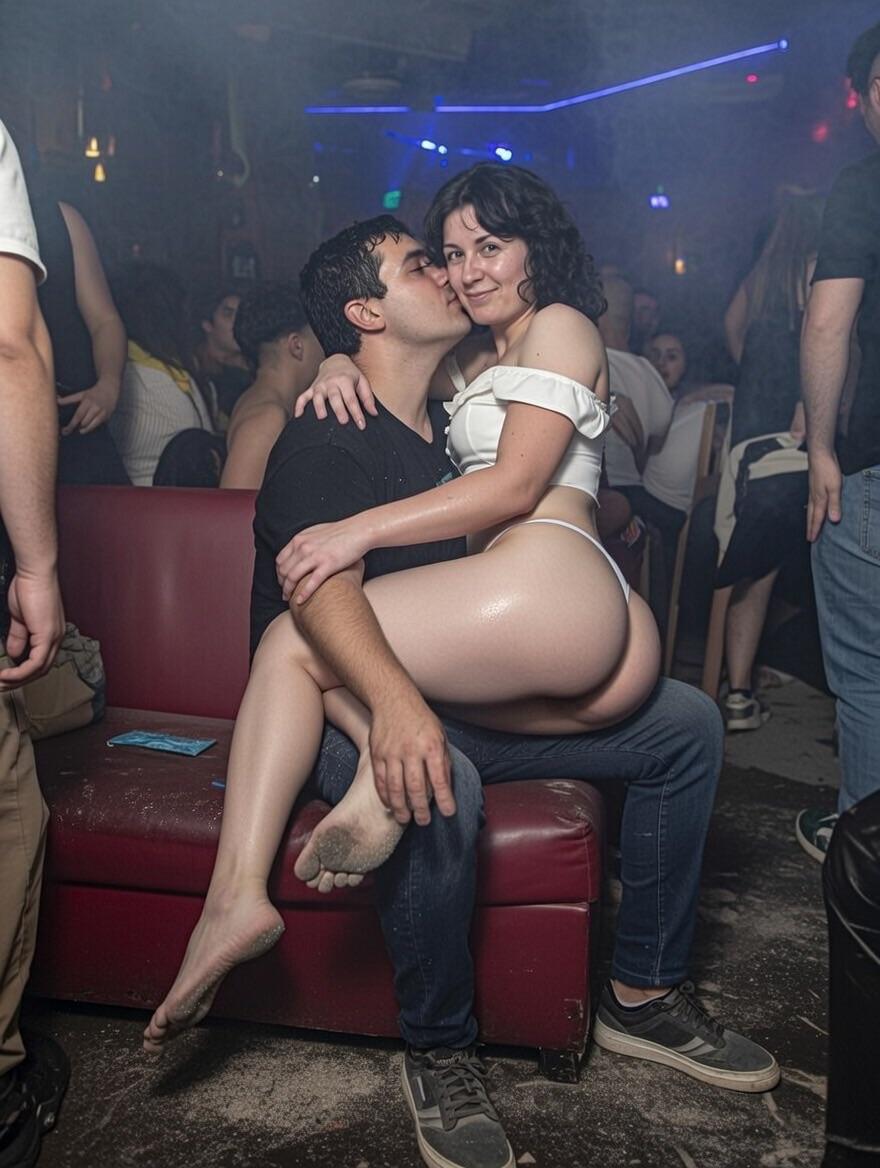 Couple In Red Booth Nightclub Photograph