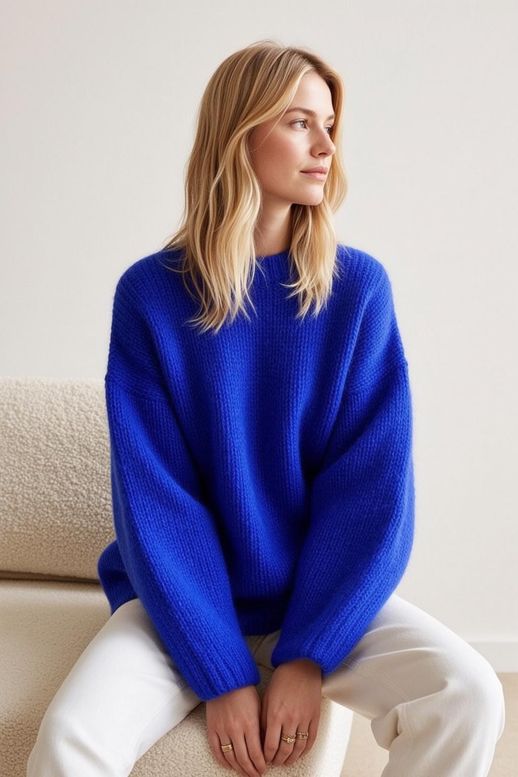 Blue Sweater White Pants Contemplative Gaze