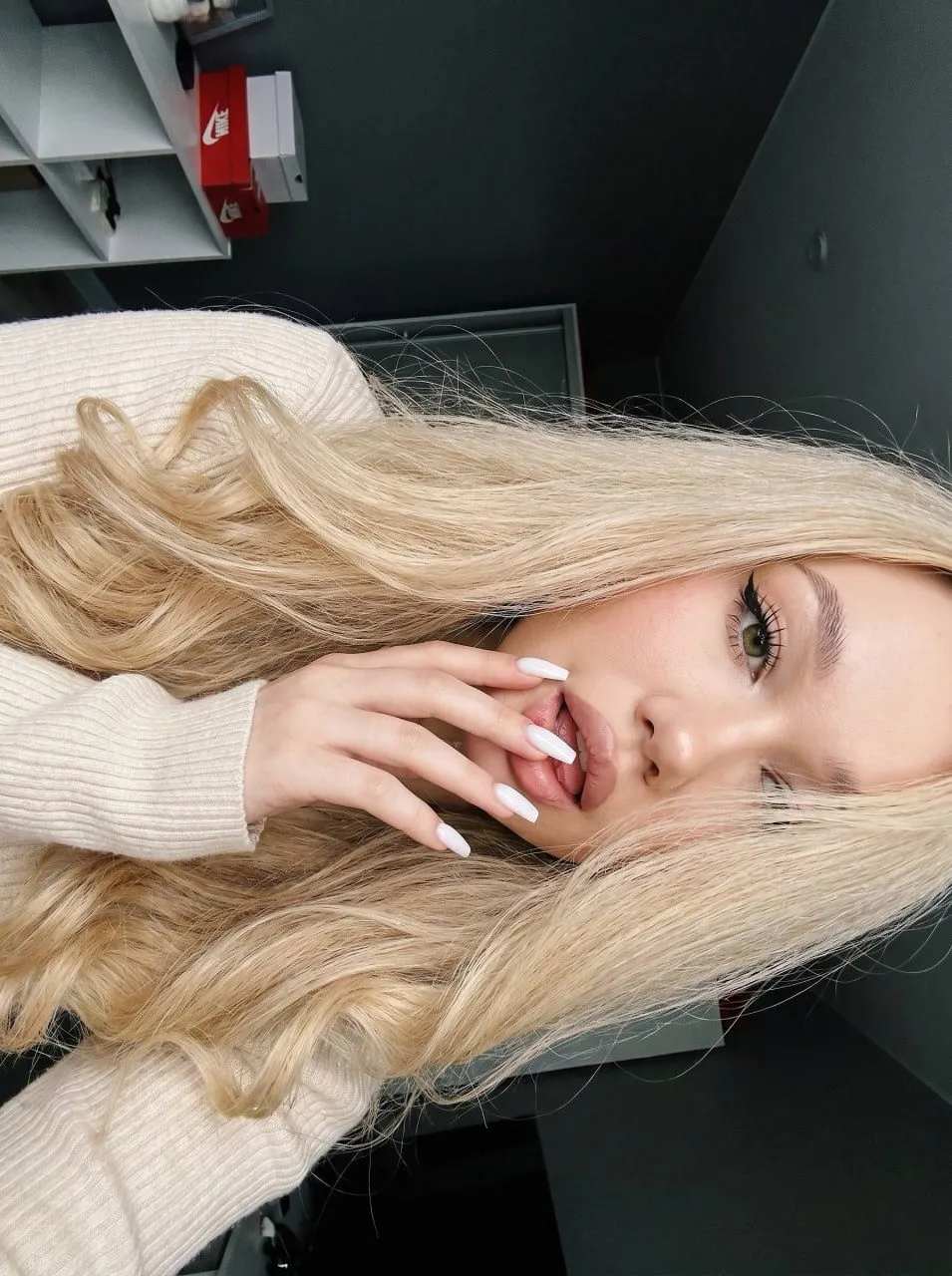 Makeup And Manicure With Cream Colored Sweater