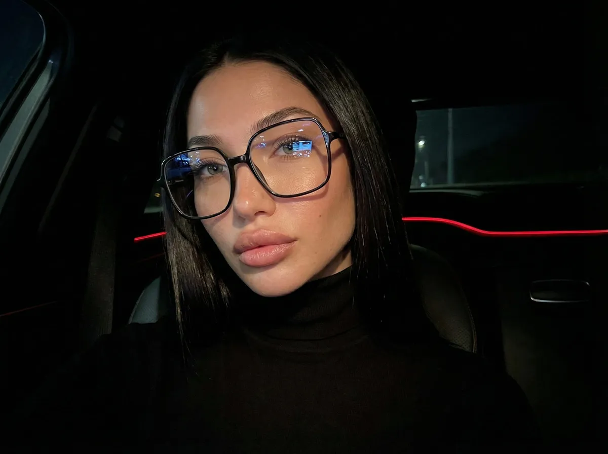 Turtleneck Glasses Car Interior Portrait