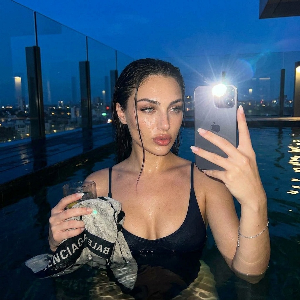 woman in a glossy wet-look fashion portrait in a blue-hour rooftop terrace.