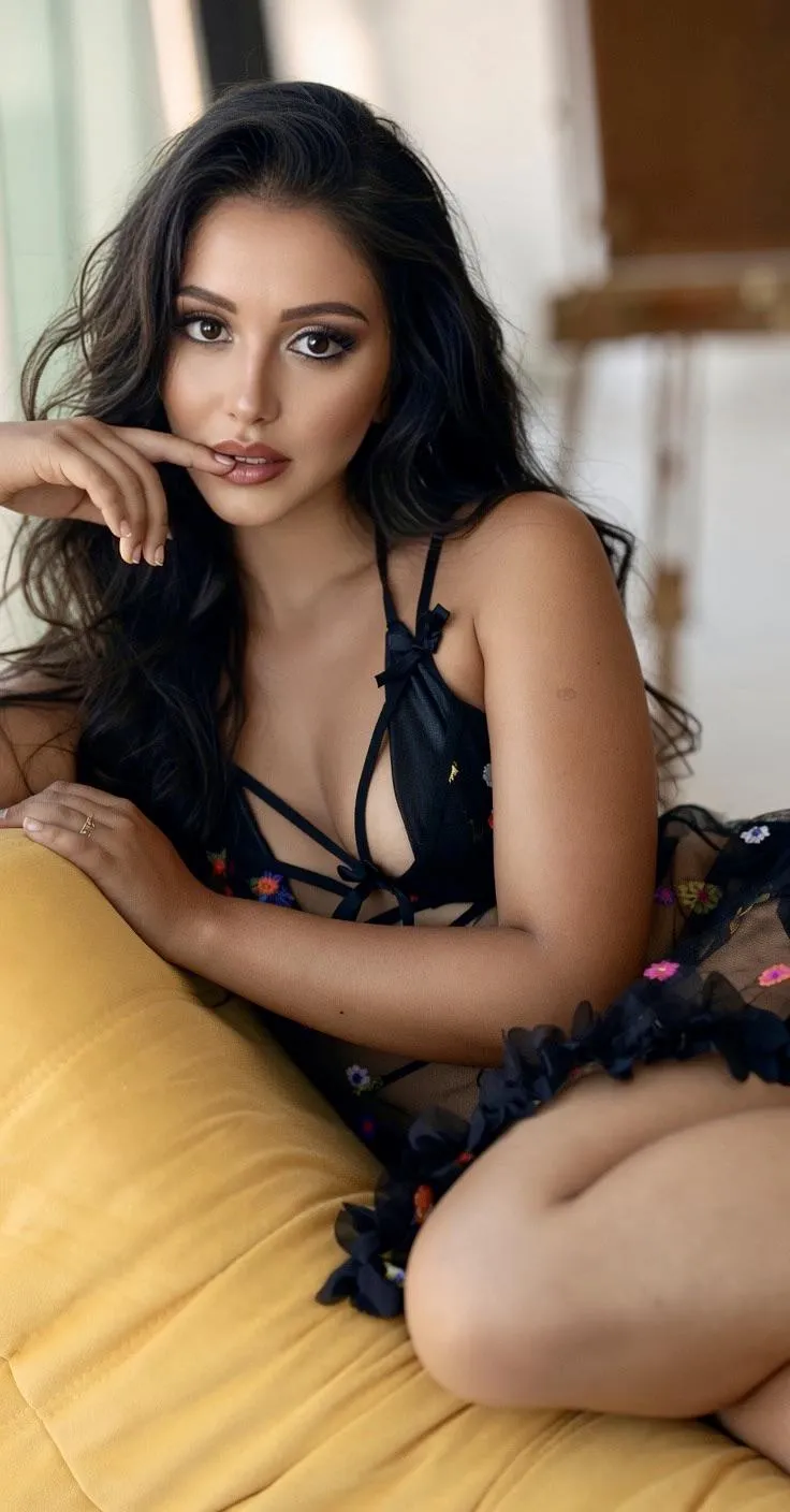 Black Sheer Lingerie Piece Featuring Intricate In Bright Upholstered