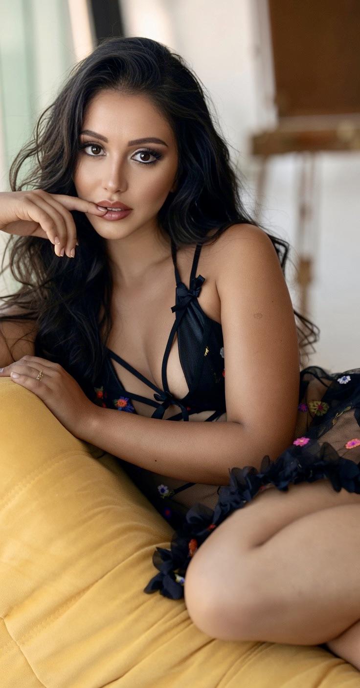 Black Sheer Lingerie Piece Featuring Intricate In Bright Upholstered