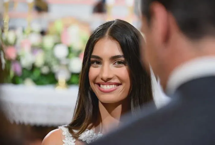 Wedding Ceremony Smiling Bride Over Shoulder Shot