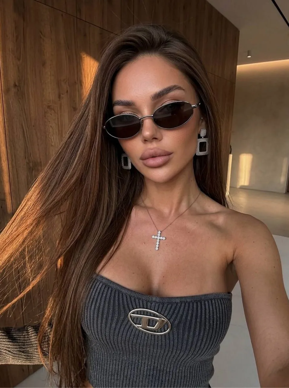 Glasses And Earrings And Necklace In Styled Portrait