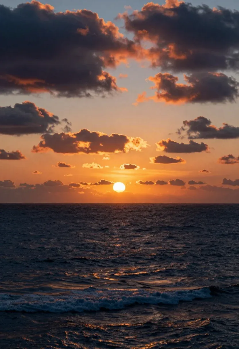 Dramatic Sunset Over Vast Ocean With The Sun Dipping Below