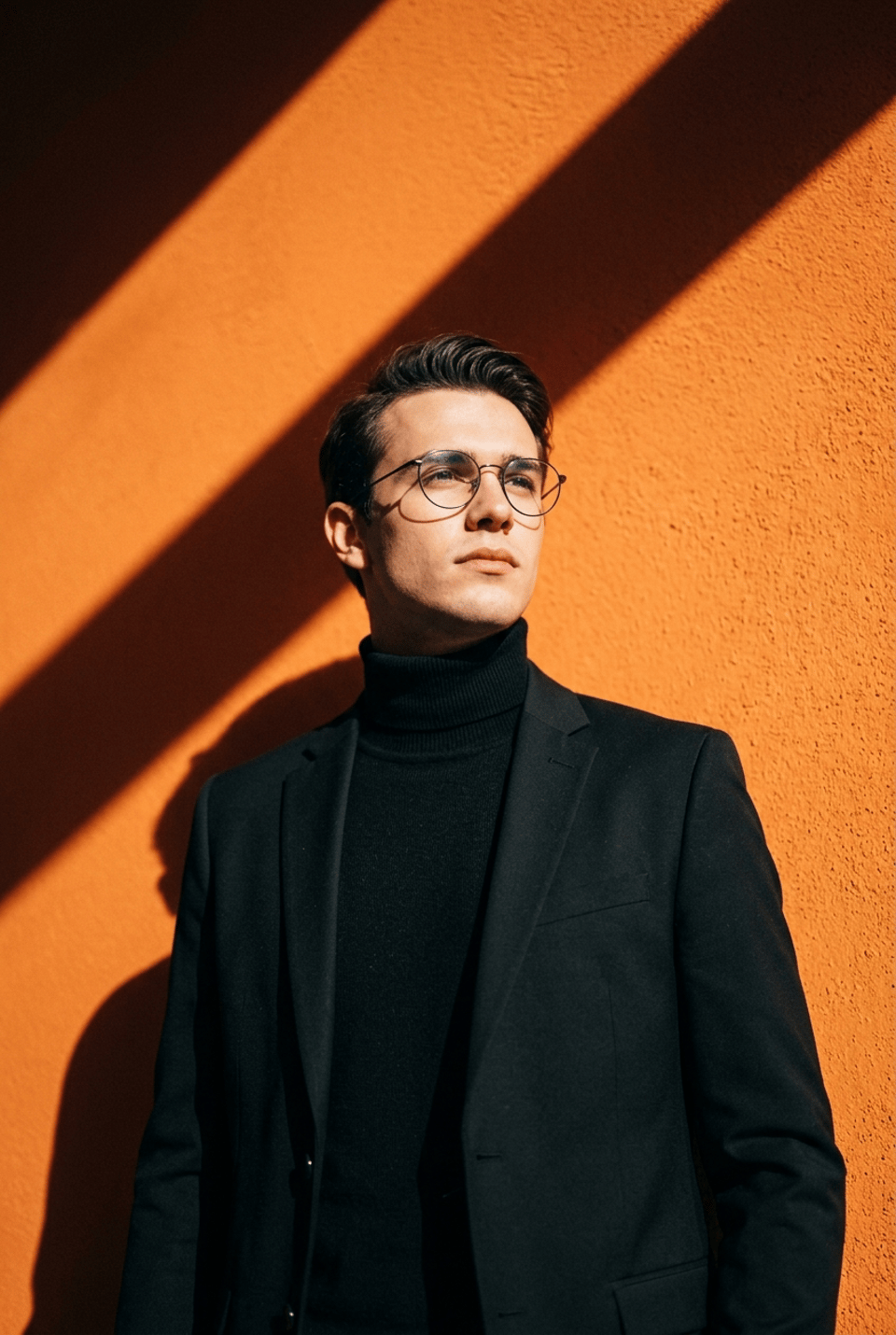 Black Turtleneck Blazer Orange Wall Diagonal Sun reference photo
