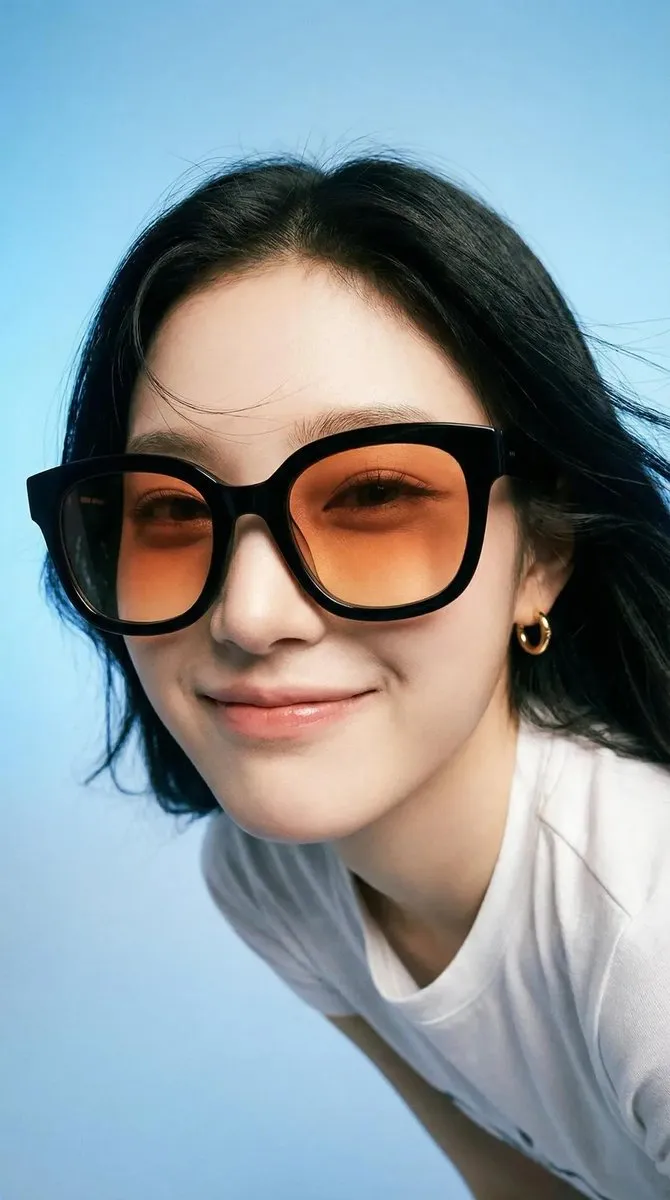 Sunglasses And Earrings In A Studio