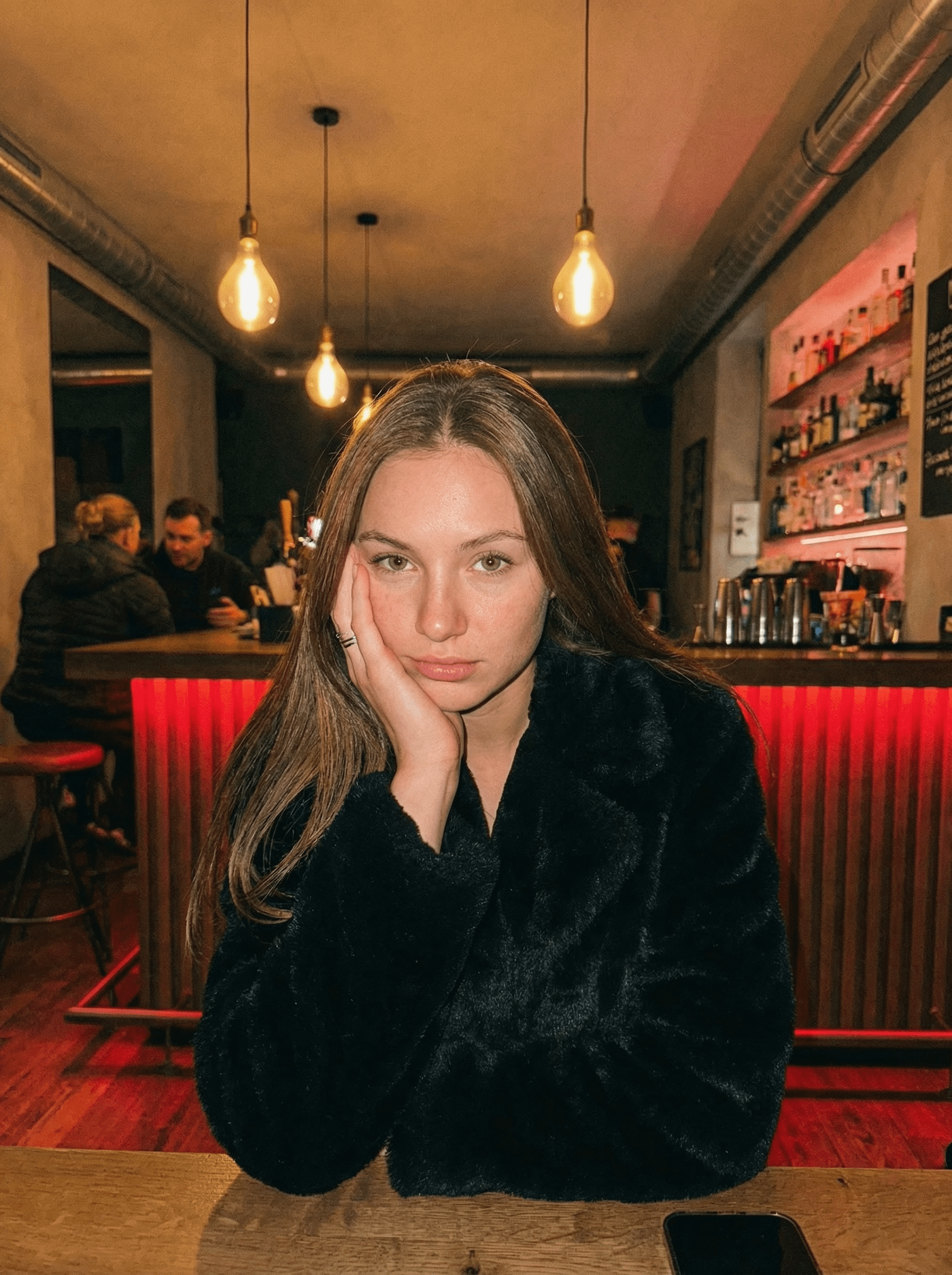 Faux Fur Coat At Dimly Lit Bar