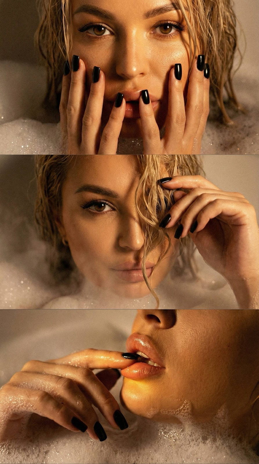 Close-up of hands near face in a warm foam bath, emphasizing wet hair and skin highlights.