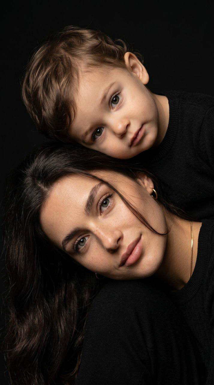 Mother And Son Touching Heads Black Background Family Harmony