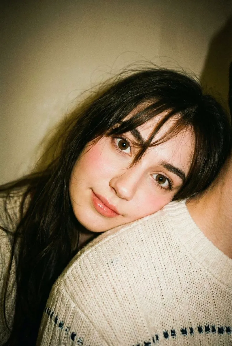 Edit this photo without changing the face. Portrait aspect ratio 2:3. Disposable