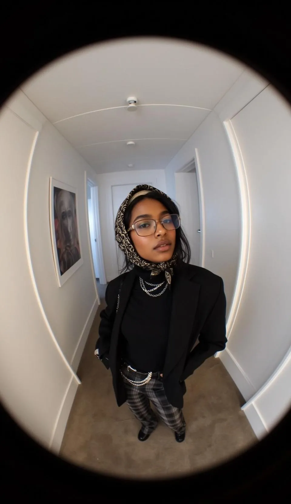 Glasses And Necklace In A Hallway