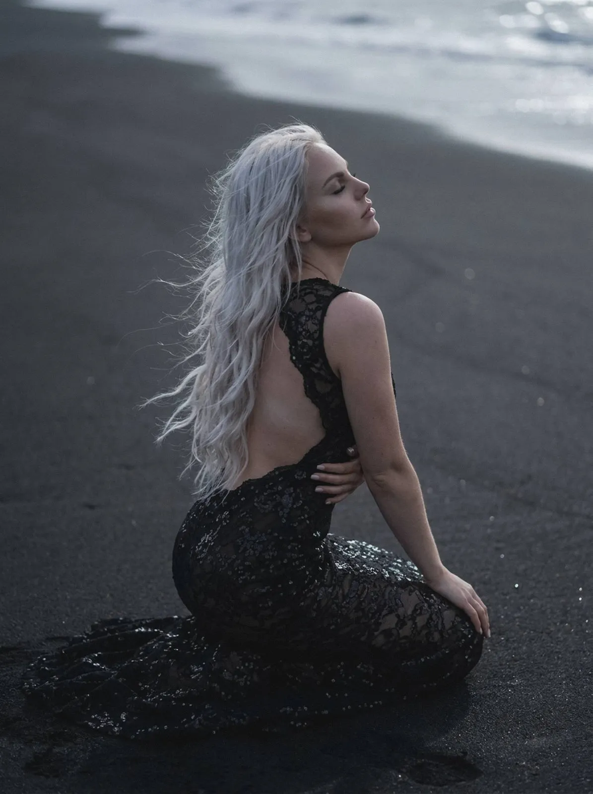 Kneeling On Dark Sand Elegant Lace Dress