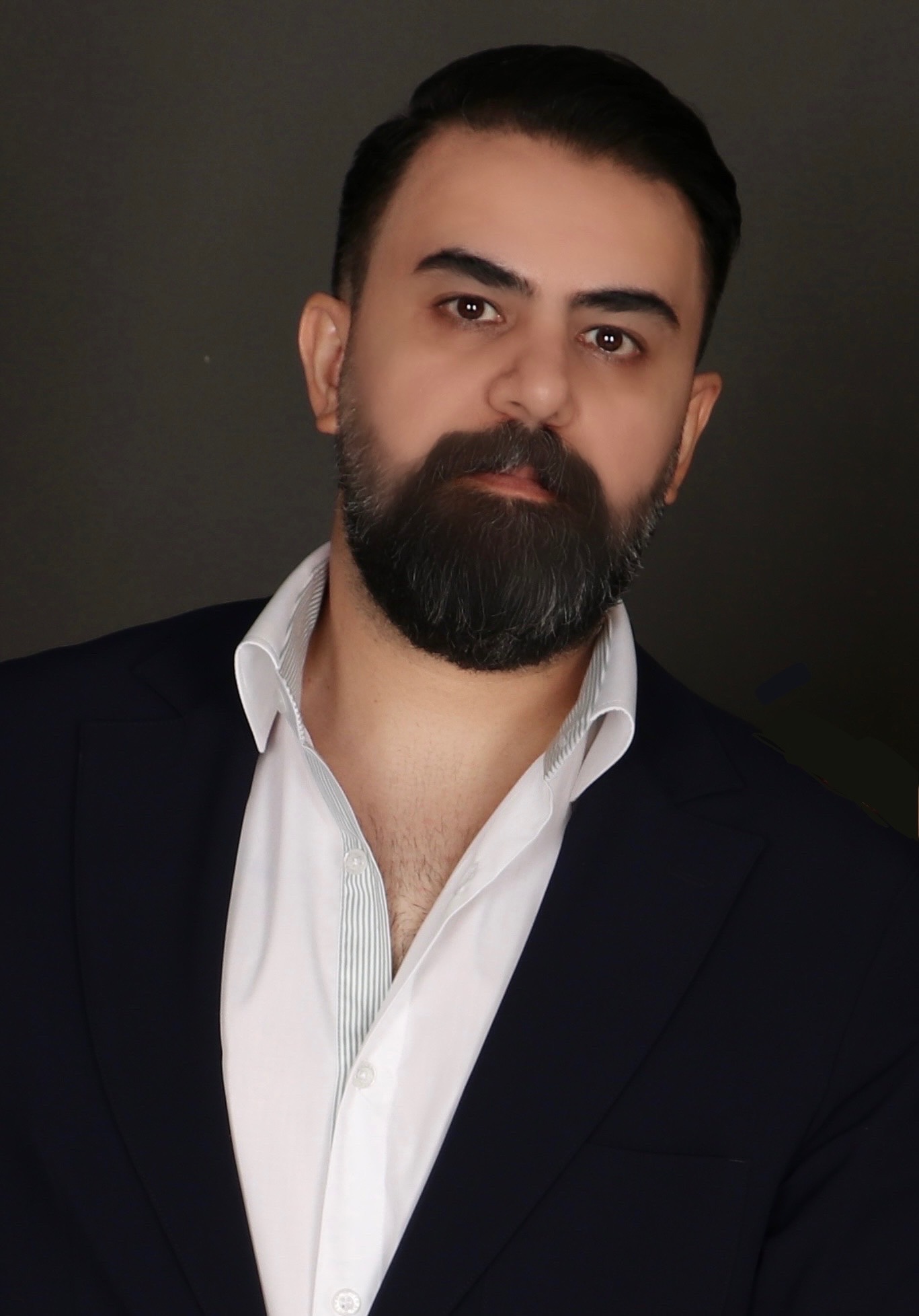 Confident Man In Navy Shirt Portrait
