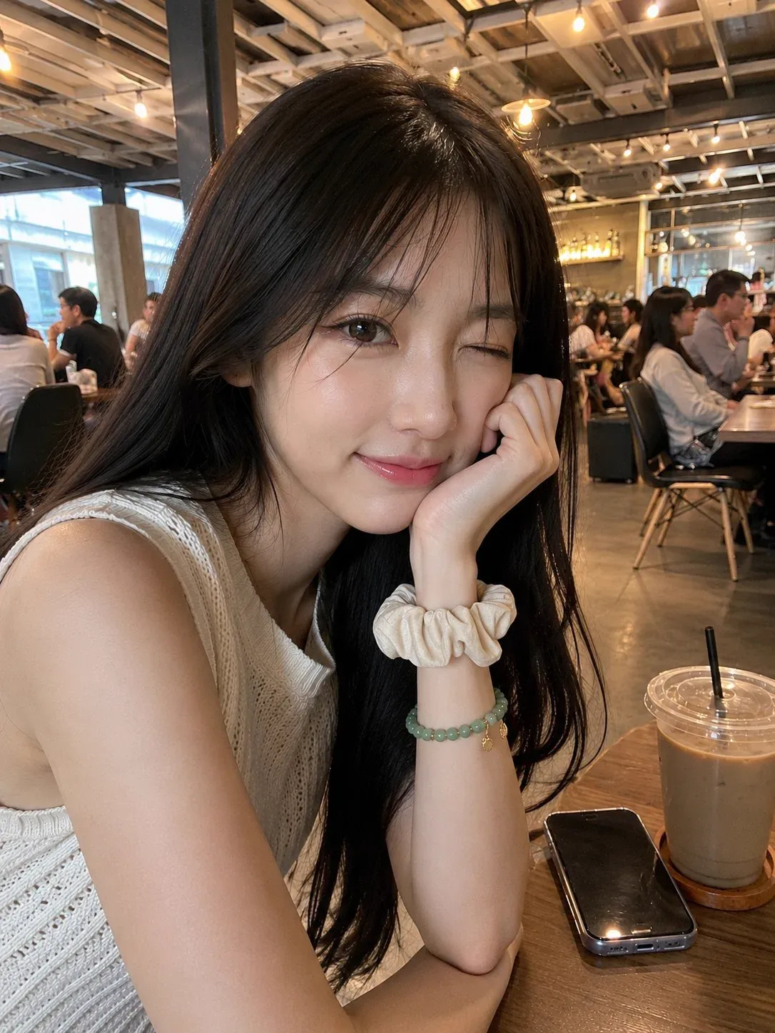 Japanese Woman In Cream Knit Top At Cafe