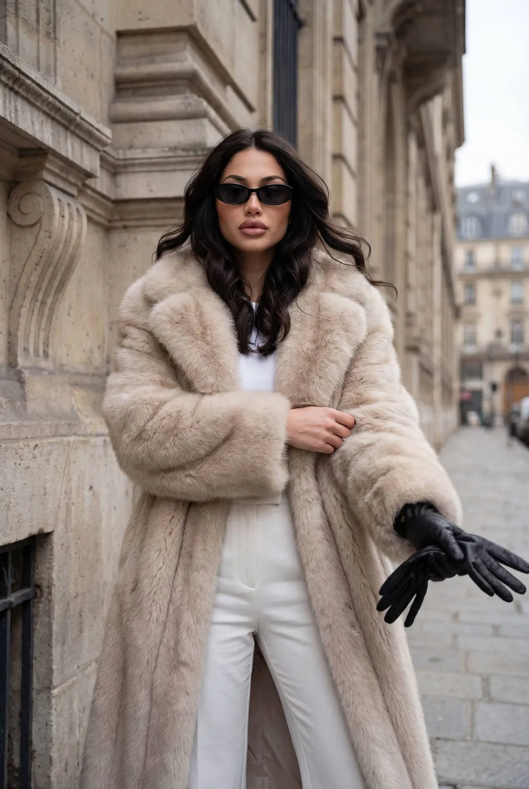 Sunglasses With Fur Coat By Stone Wall