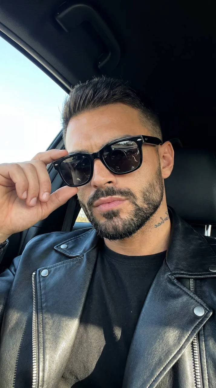 Lowering Sunglasses Inside Car Interior Selfie