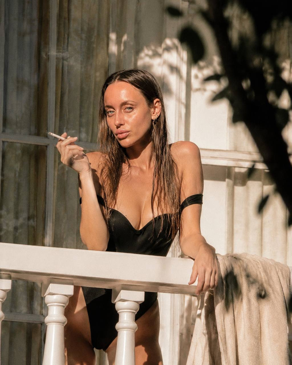 Girl In Black Swimsuit On White Balcony Summer Film