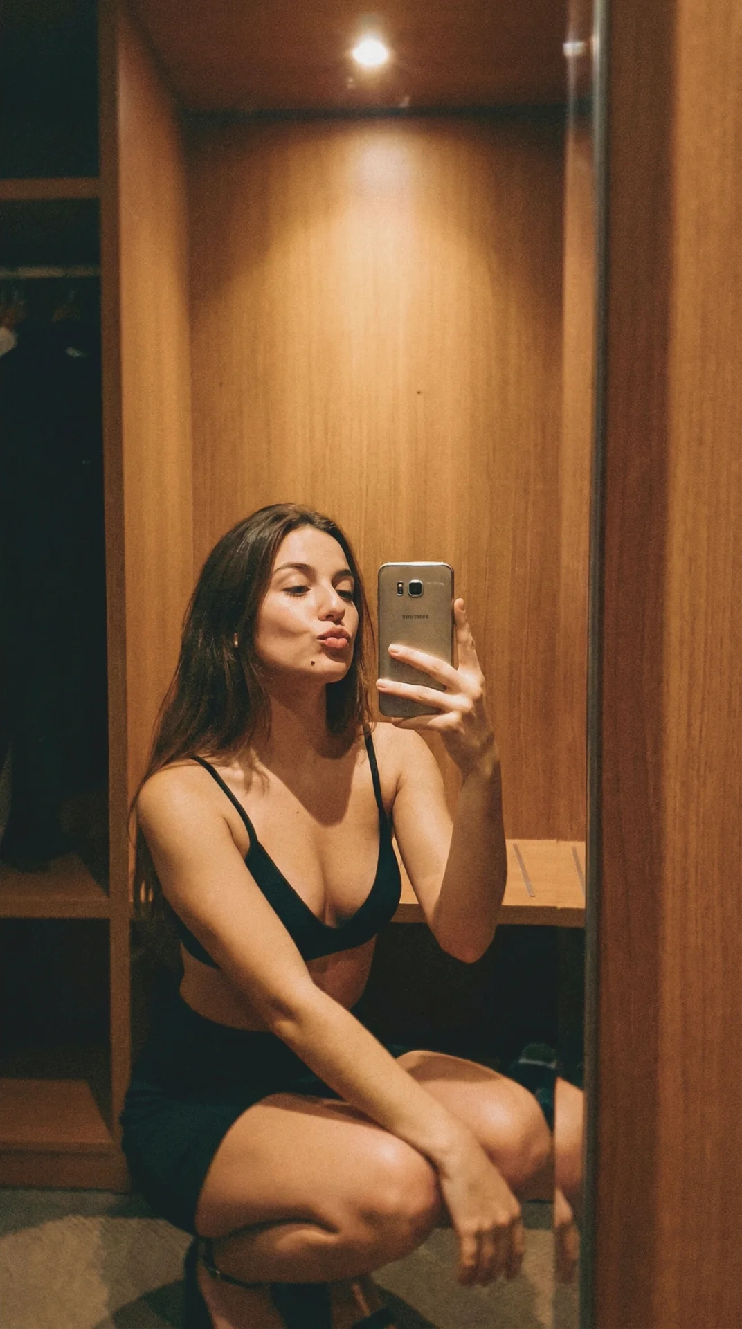 Young Woman Closet Mirror Selfie