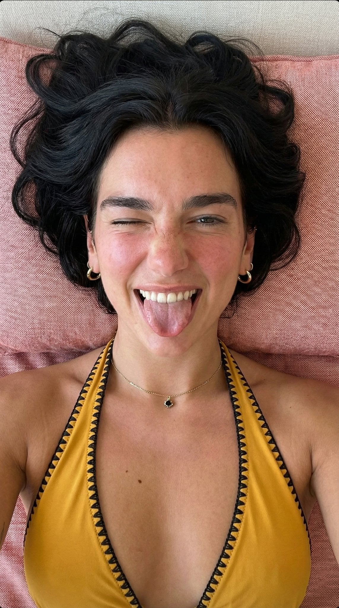 Yellow Bikini Wink Pink Textured Surface High Angle