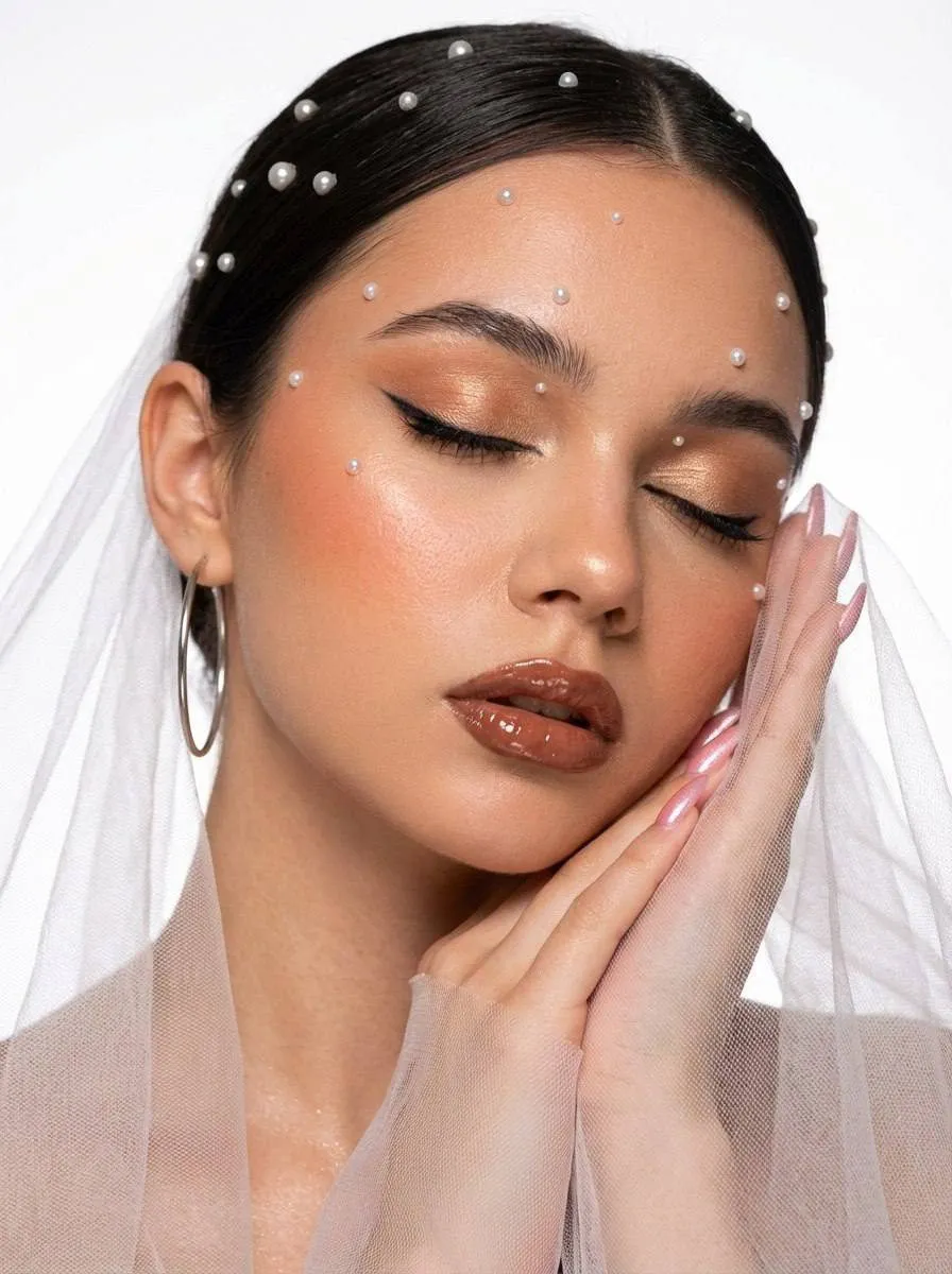 Makeup Manicure And Earrings In A Pearl Beauty Portrait