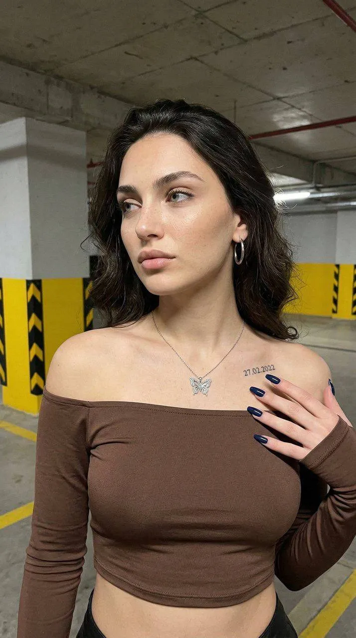 Tattoos Makeup Earrings Necklace And Manicure In Portrait