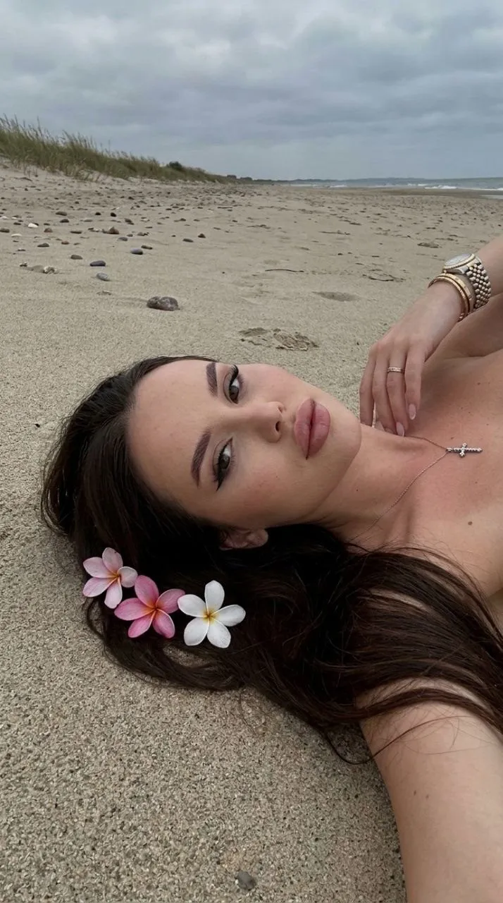 Overhead Beach Selfie With Flowers In Hair
