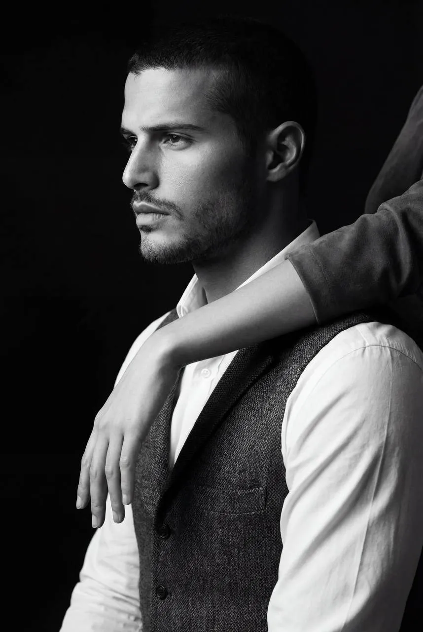 Dark Vest Profile Portrait
