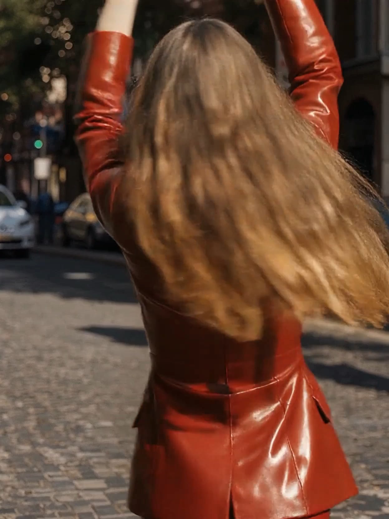 Glossy On Cobblestone City Street