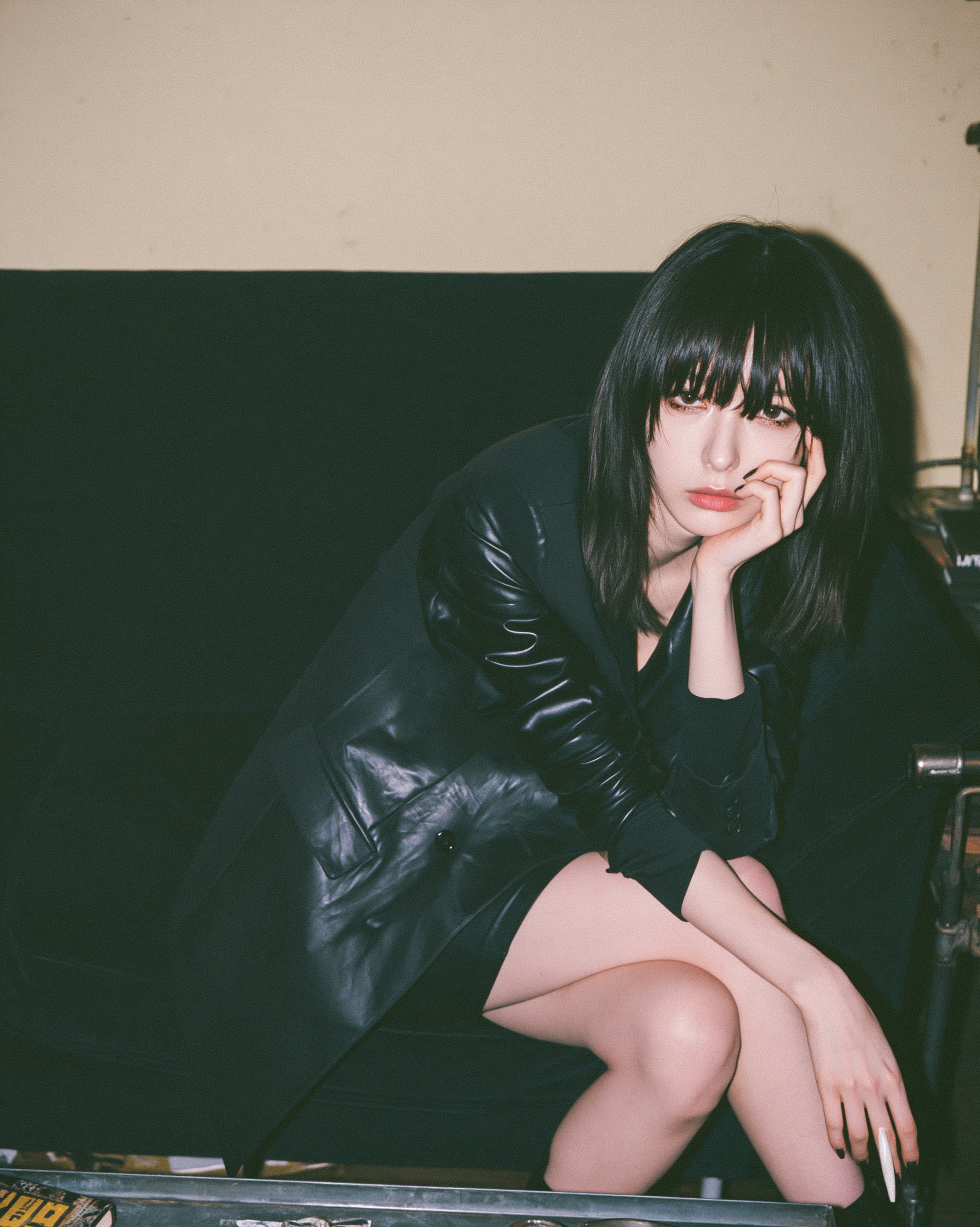 Black Blazer Leather Sleeves Dim Moody Lighting