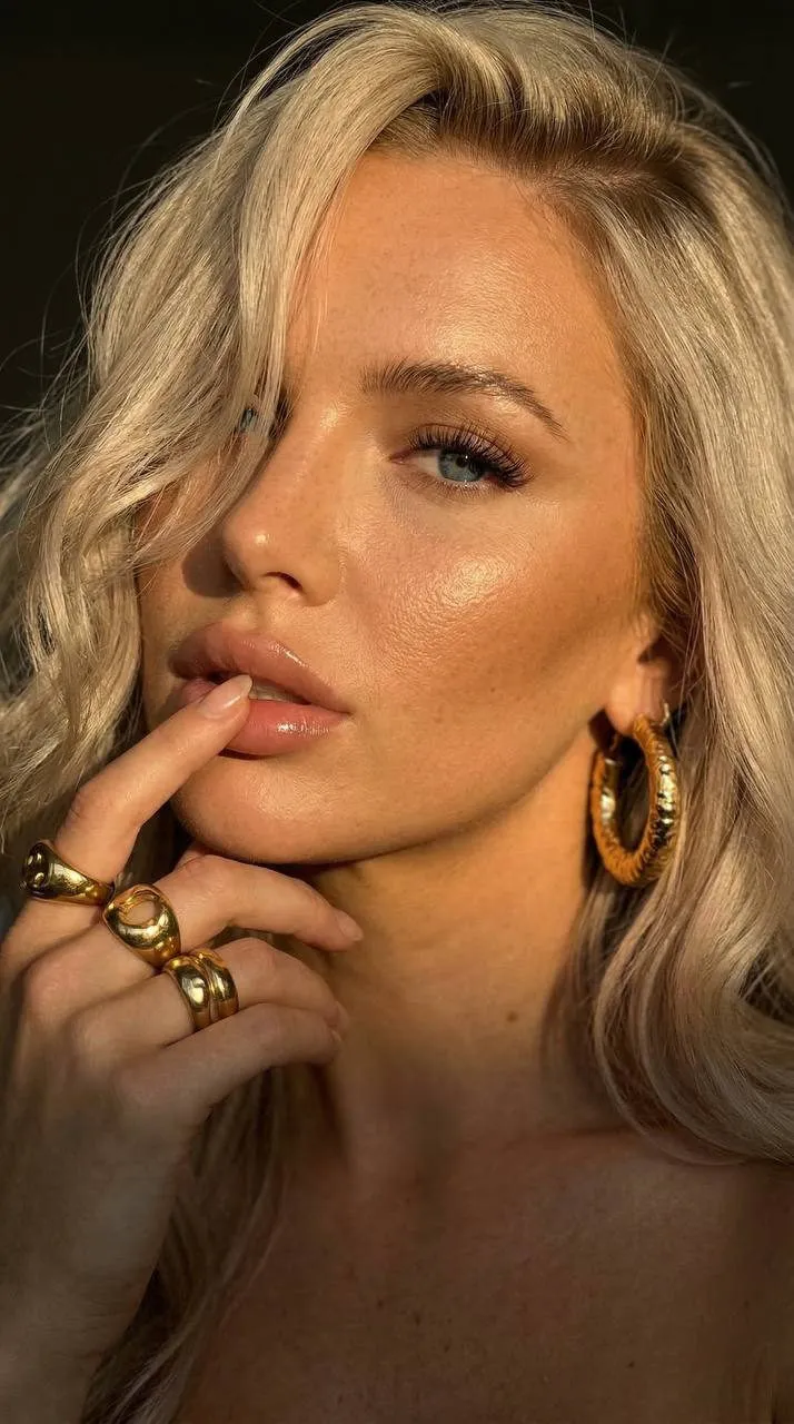 Earrings And Rings In Styled Portrait