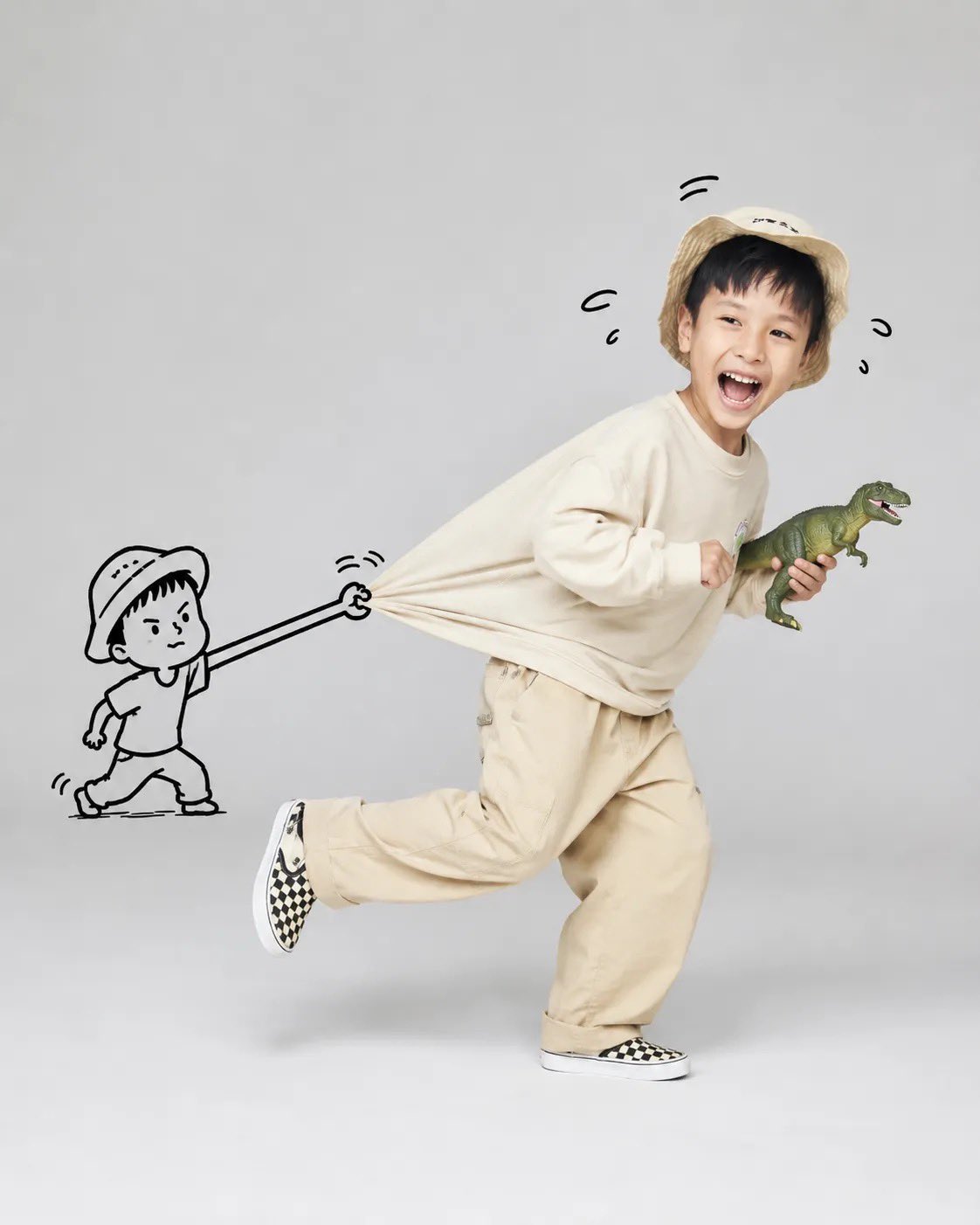 Child Running Excited In Beige Outfit With T Rex Toy